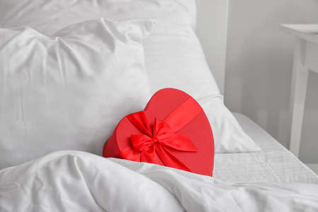 Gift for Valentine's Day on bedの写真素材