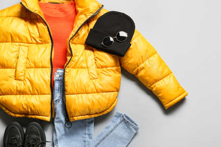 Stylish winter clothes on gray backgroundの写真素材