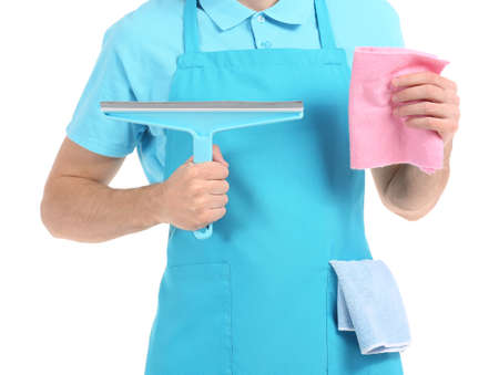 Young worker of cleaning service with window cleaner and rag on white background