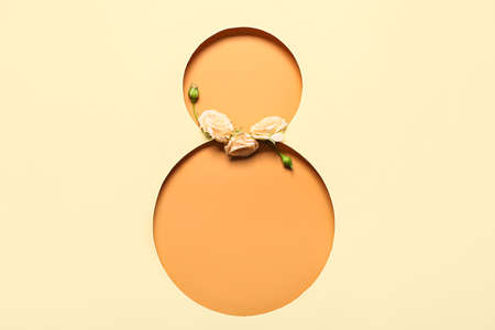 Composition with beautiful flowers for International Women's Day on beige background