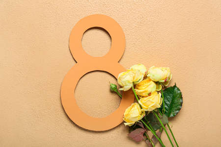 Composition with beautiful flowers for International Women's Day on beige backgroundの写真素材