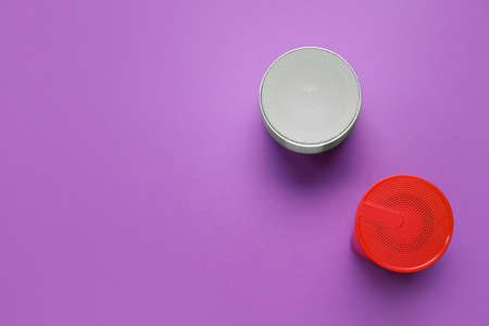 Wireless portable speakers on purple backgroundの写真素材