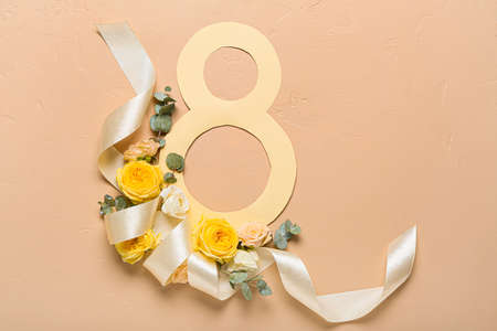 Composition with beautiful flowers for International Women's Day on color backgroundの写真素材