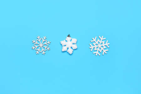 Beautiful composition with snowflakes on blue backgroundの写真素材
