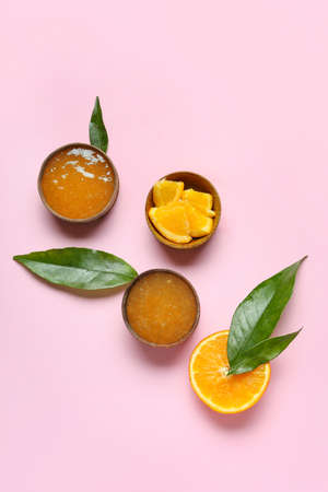 Composition with tasty orange jam on pink backgroundの写真素材