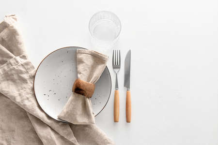 Elegant table setting on light backgroundの写真素材