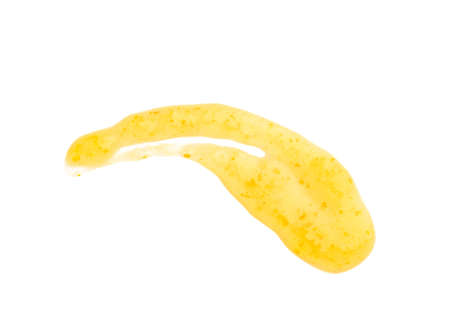 Smear of delicious orange jam on white backgroundの写真素材