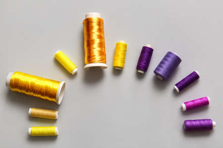 Thread spools on light background