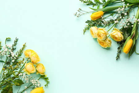 Composition with beautiful flowers on blue backgroundの写真素材