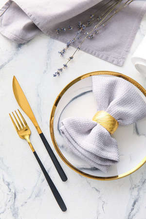 Elegant table setting on light backgroundの写真素材