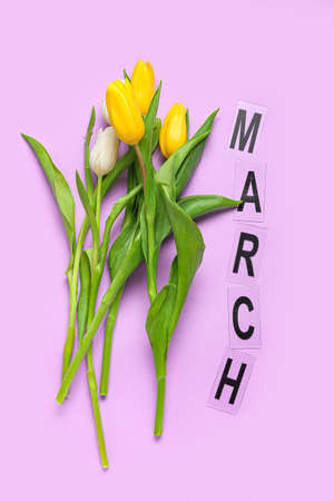 Beautiful tulips and word MARCH on lilac backgroundの写真素材