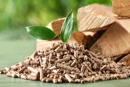 Pile of wood pellets on table, closeup