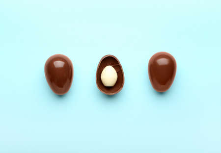 Chocolate Easter eggs on blue backgroundの写真素材