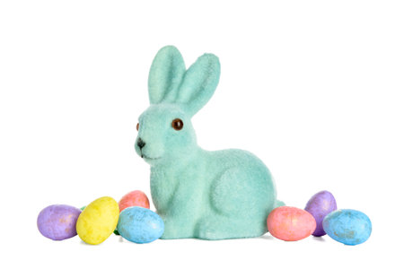Cute Easter bunny and eggs on white backgroundの写真素材