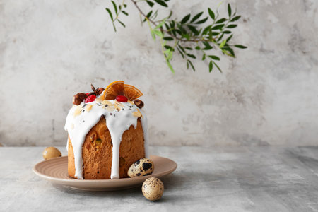 Plate with delicious Easter cake and eggs on tableの写真素材