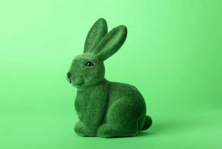 Beautiful Easter bunny on green backgroundの写真素材