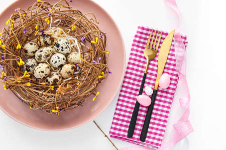 Stylish Easter table setting on white backgroundの写真素材