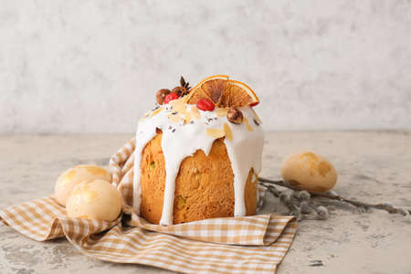 Delicious Easter cake, pussy willow branches and eggs on table