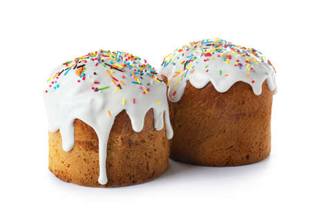 Delicious Easter cakes on white background