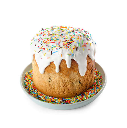 Plate with delicious Easter cake on white background