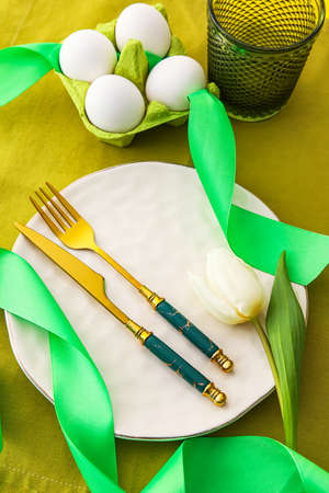 Stylish table setting for Easter celebration, closeup