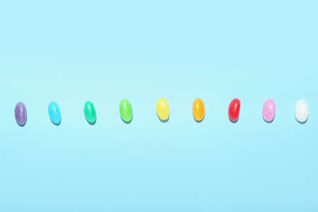 Different jelly beans on blue backgroundの写真素材