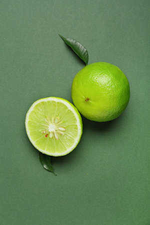 Ripe bergamot fruits on green backgroundの写真素材