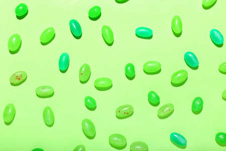 Different jelly beans on green backgroundの写真素材