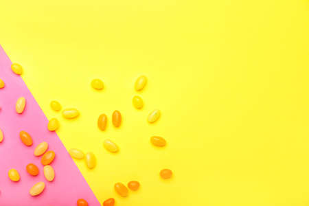 Different jelly beans on color backgroundの写真素材