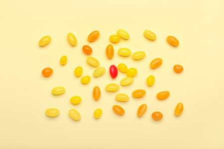 Different jelly beans on beige backgroundの写真素材