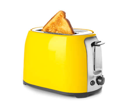 Modern toaster with bread slice on white background