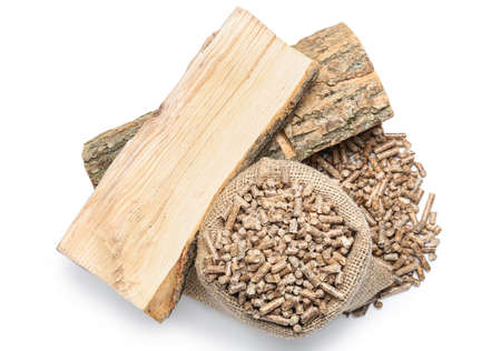 Bag with pellets and firewood on white background