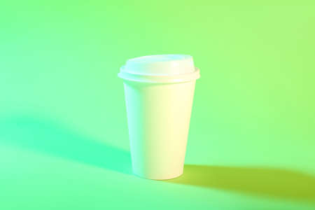Takeaway paper cup on green backgroundの写真素材