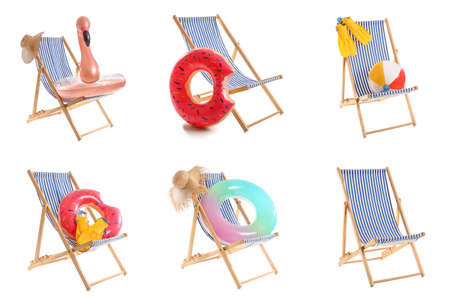 Set of deck chairs and beach accessories isolated on white