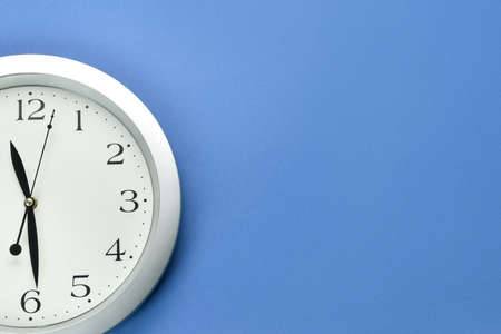 New modern clock on blue backgroundの写真素材