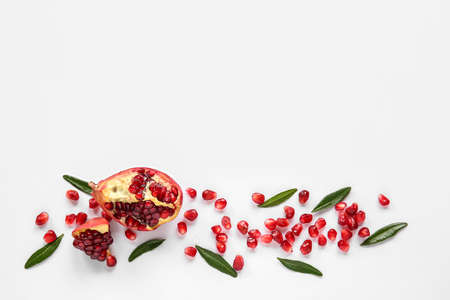 Beautiful composition with pomegranate on white backgroundの写真素材