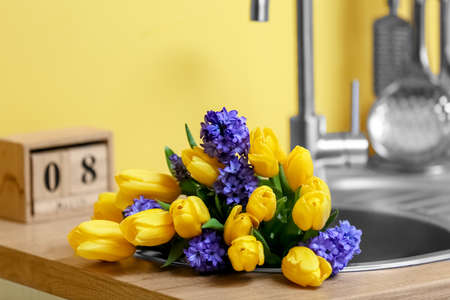 Bouquet of different flowers in sink, closeupの写真素材