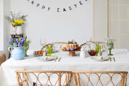 Beautiful setting on table served for Easter celebration in room