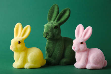 Cute Easter bunnies on green backgroundの写真素材