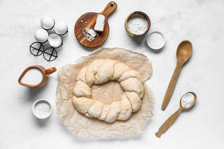 Uncooked Italian Easter bread on light backgroundの写真素材