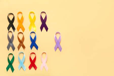 Set of awareness ribbons on color background. world cancer day concept
