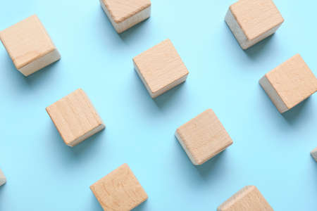 wooden cubes on blue background