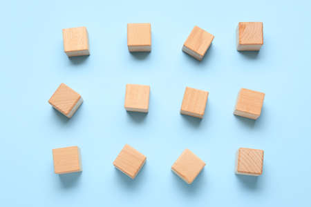 wooden cubes on blue backgroundの写真素材