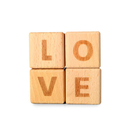 Word LOVE made of wooden cubes on white backgroundの写真素材