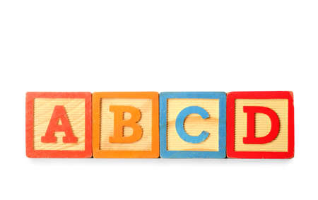 Wooden cubes with letters isolated on white