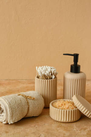 Set of bath supplies with sea salt on color backgroundの写真素材