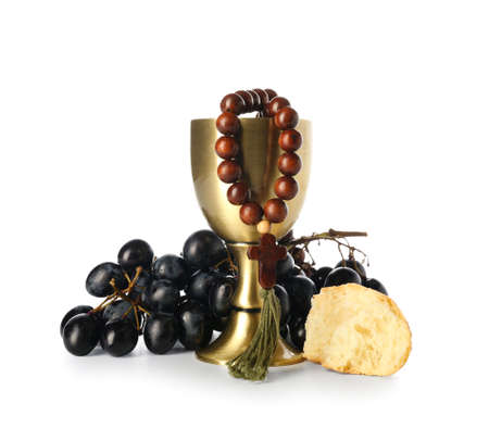 Cup of wine with grapes, bread and rosary on white backgroundの写真素材