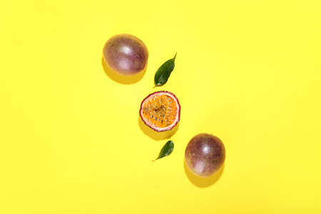 Delicious passion fruit on yellow backgroundの写真素材