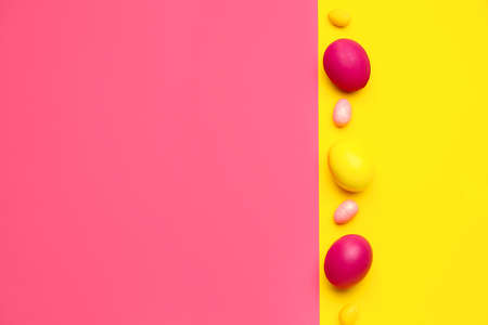 Painted eggs for Easter celebration on color background