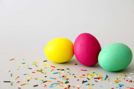 Painted eggs for Easter celebration on gray backgroundの写真素材